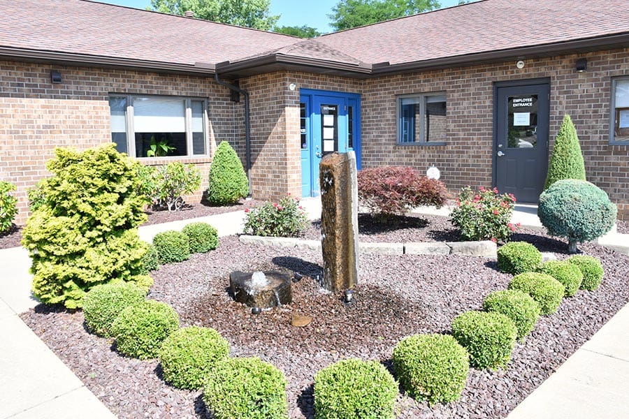 Canfield, OH - Closeup of Gem-Young Insurance & Wealth Advisors Office Building on a Sunny Day