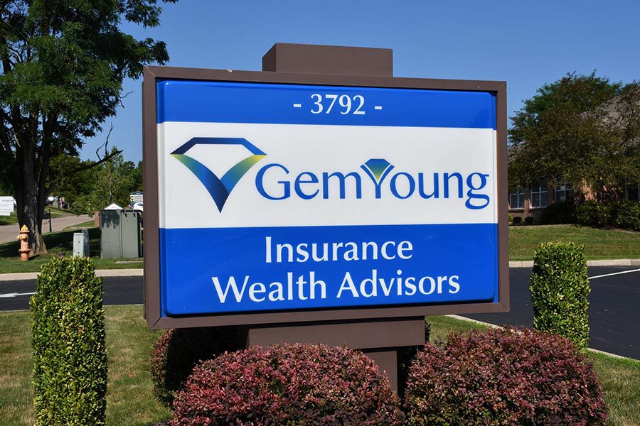 Contact - Closeup View of Gem-Young Insurance & Wealth Advisors Office Sign
